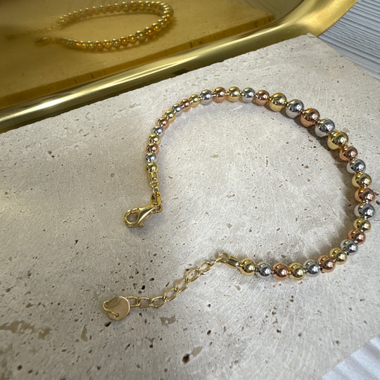 9ct Yellow, White & Rose Gold Graduated Ball Cuff Bracelet