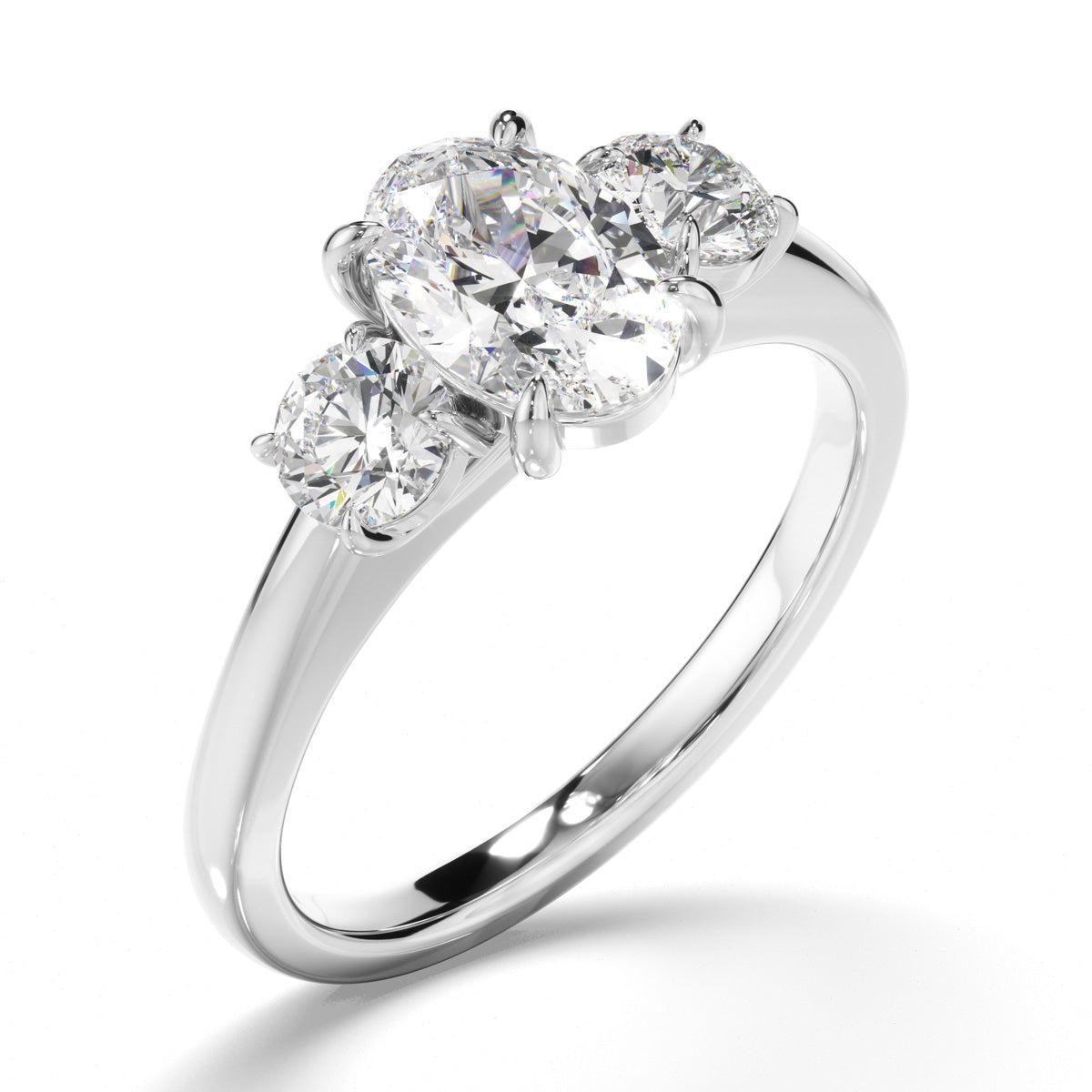 Oval Cut Diamond Trilogy Engagement Ring with Round Brilliant Sides